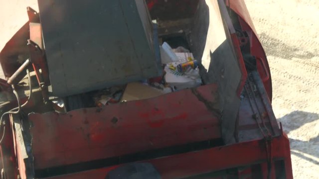 4K UltraHD video of collecting garbage into the car