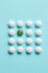 white and green pills