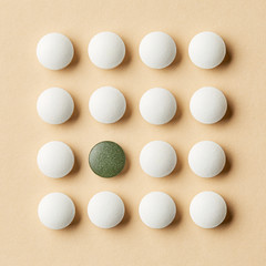 white and green pills