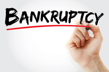 Hand writing Bankruptcy with marker, concept background