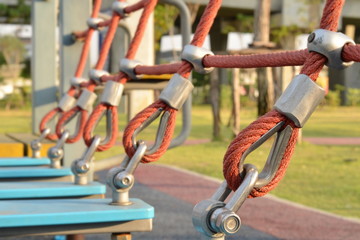 Perspective of rope slings in the playground,use a symbol for strength, tolerance, endeavor concept,construction equipment.