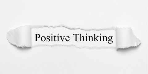 Obraz premium Positive Thinking on white torn paper