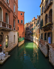 Obraz na płótnie Canvas Scenic view of colorful Venetian architecture and canal in Venice, Italy