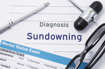 Diagnosis Sundowning. Medical note surrounded by neurologic hammer, mental status exam with an...