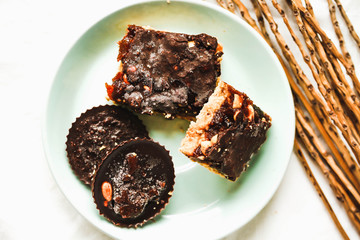 Raw dessert, healthy vegan candy with caramel and nuts, top view