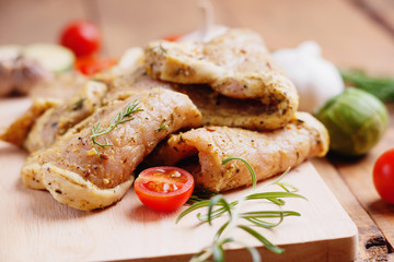 Raw marinated pork meat and vegetables