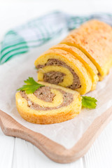 Egg rolls with meat on a white background