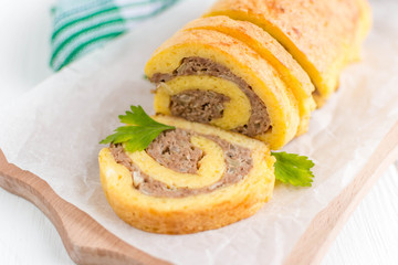 Egg rolls with meat on a white background
