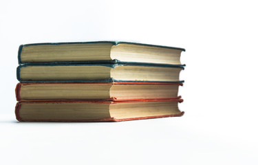 pile of red and blue books