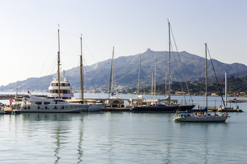 Fototapeta na wymiar luxury yachts parked at the shore of the island of Zakynthos, Greece