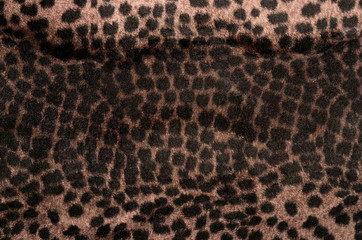 Brown and black leopard pattern.