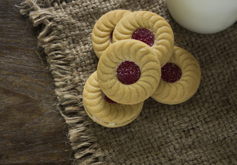 Cookies and milk placed on the wooden floor