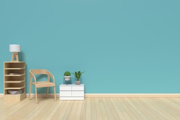 The interior has a gray sofa and lamp on empty blue wall background,3D rendering