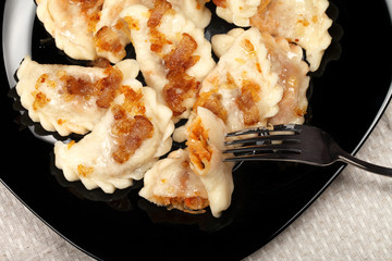 Traditional Ukrainian dumplings with bacon