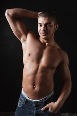 Fototapeta na wymiar Attractive shirtless african american fitness man standing and posing