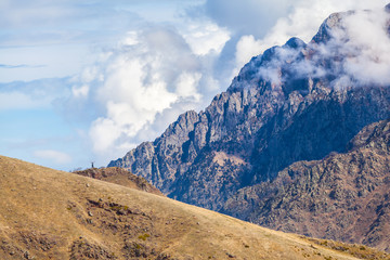 Mountain landscape near the village Stepantsminda Georgia in the early morning with fog. Spring season.