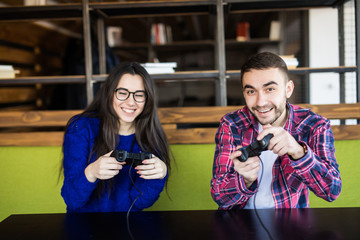 cute couple playing video games