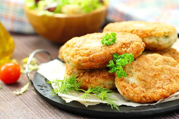 Chicken cutlets with vegetables and herbs