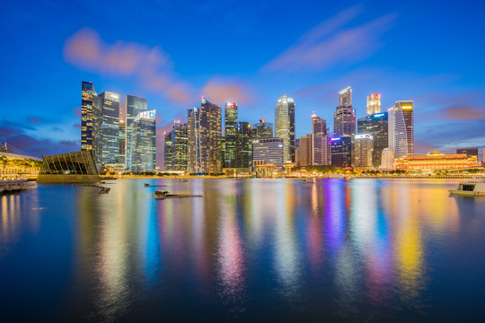 Singapore city skyline at night by Marina bay