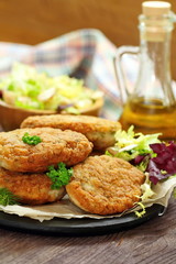 Chicken cutlets with vegetables and herbs