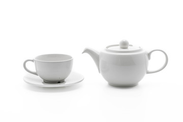 white tea pot with tea cup