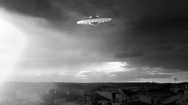 3D animation loop - UFO flying over a city 