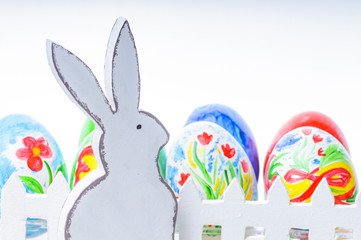 Easter composition with colorful Easter eggs and bunny