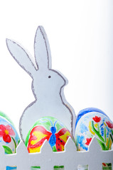 Easter composition with colorful Easter eggs and bunny