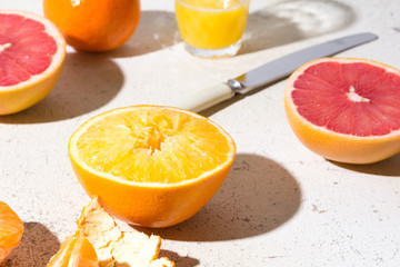 different kinds of citrus on white background
