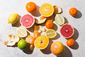 different kinds of citrus on white background
