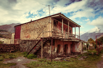 Old houses in a mountain village. Toned