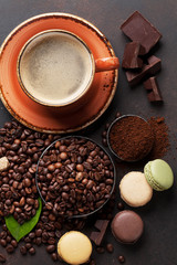 Coffee cup, beans, chocolate