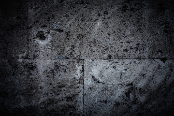 Wall of new gray bricks. Urban background. Toned