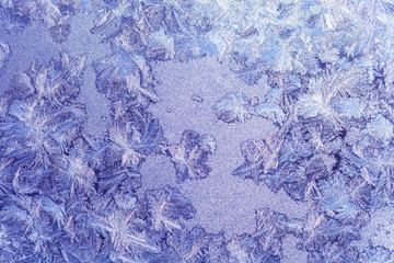 Beautiful nature pattern on frosted glass. Selective focus. Tone