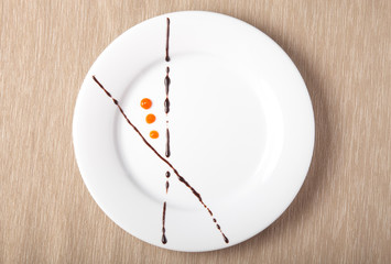 Plate painted strokes of different sauces