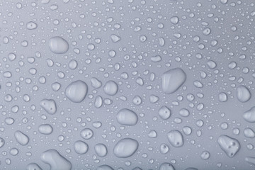 Drops of water on a color background