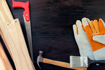 Equipment and tool kit on wooden background