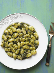 rustic italian gnocchi in pesto sauce