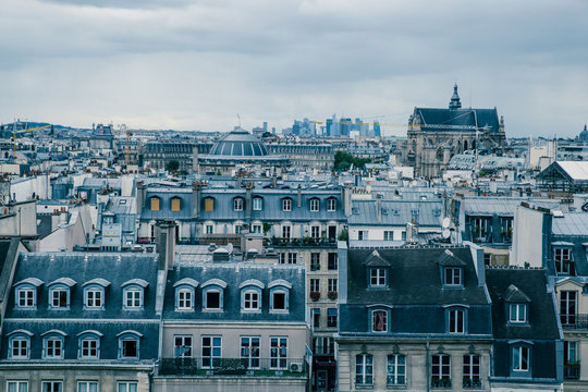 Paris buildings rooftops on cloudy rainy grey day