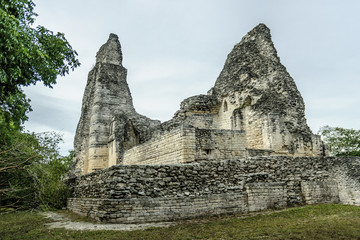 Fototapeta na wymiar Mayan building in ruins in the archaeological Xpuhil enclosure in the reservation of the Mayan biosphere of Calakmul in campeche, Mexico.