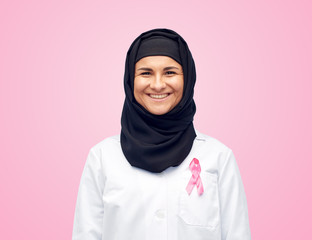 muslim doctor with breast cancer awareness ribbon