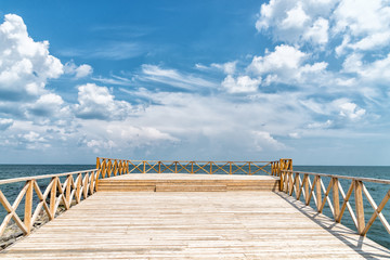 Wooden pier with blue sea