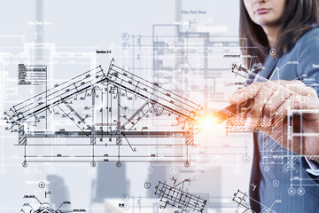 Woman engineer at work . Mixed media