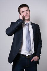 Successful businesswoman smiling talking on a cell phone