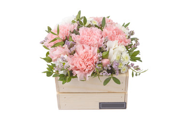 Bright buketny composition from fresh flowers, the white isolated background
