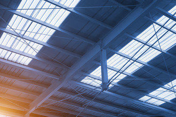 Industry ceiling with sun's rays in cyanotype picture style 