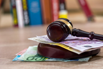 concept on corruption in justice. Judge gavel and euro money.