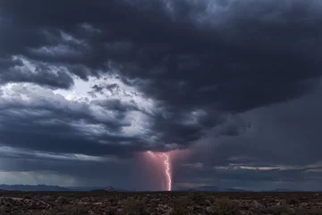 Fotobehang Thunderstorm with lightning and dark sky © JSirlin