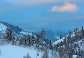 Sunset winter Ukrainian Carpathian Mountains landscape.