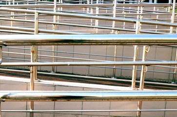 shiny metal railing in the urban environment. For the movement of persons with disabilities